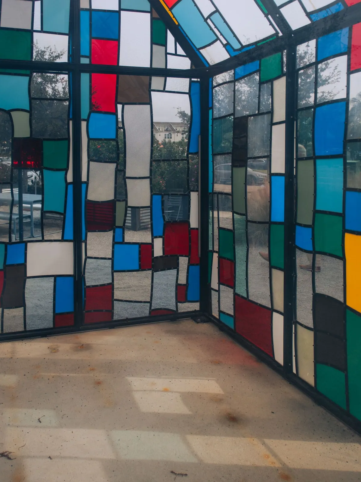 Colourful contemporary glass architecture as a metaphor for the layered associations of the name Shezan